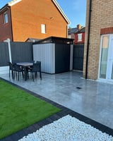 Modern backyard patio with dining furniture