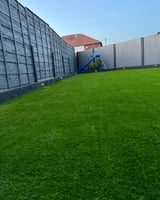 Sports field with artificial turf